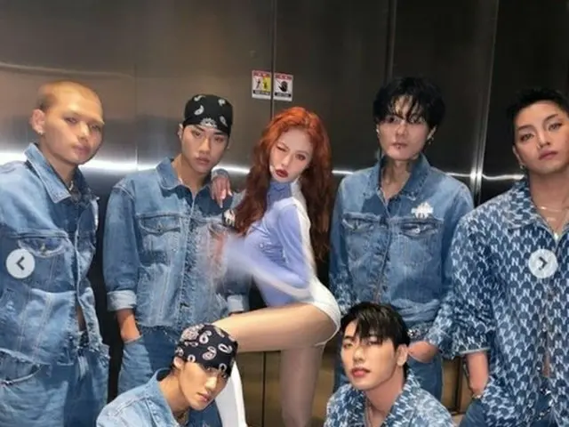 HyunA, a provocative pose surrounded by 6 men. Unique sexy beauty.