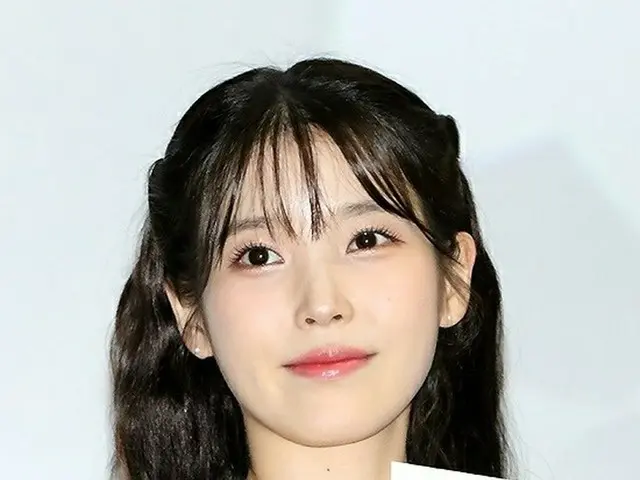 It is reported that IU was accused of ”plagiarism” for 6 songs including ”Thered shoes”. Seoul Gangn